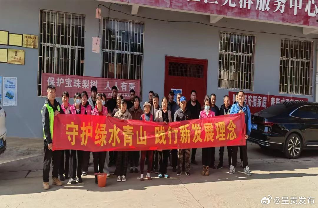 段家营社区开展捞鱼河美化活动
